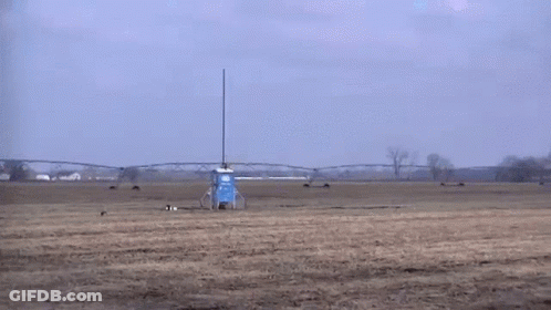 Blue Toilet Flying Through Air GIF