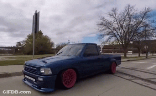 Blue Truck With Red Wheels GIF