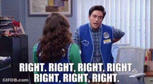 Blue Vest Man Talking To Green Shirt Woman GIF