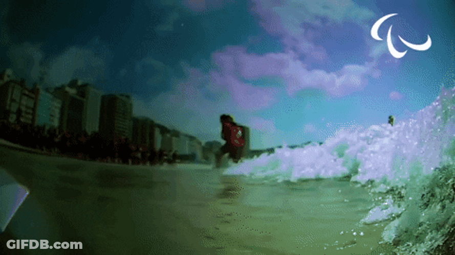 Blue Wave Splashes On The Camera GIF