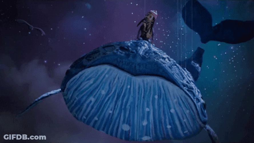 Blue Whale Flying Beneath Starry Night GIF