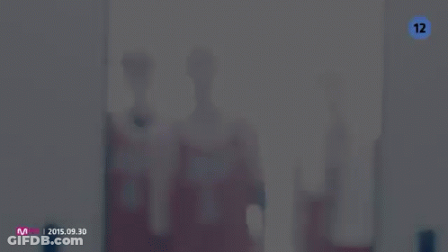 Blue White Soccer Player Kicking Ball GIF