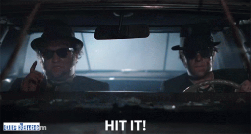 Blues Brothers Poster Two Men In Car Saying Hit It GIF