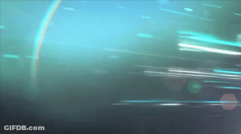 Blurred Blue Background With Rainbow GIF