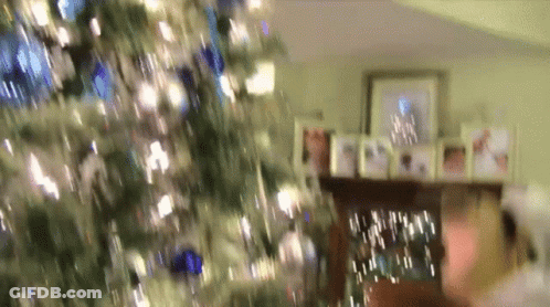 Blurred Christmas Tree With Fireplace GIF