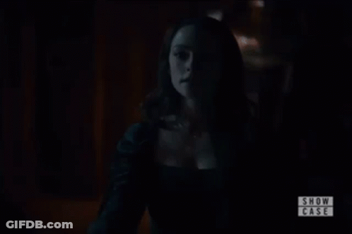 Blurred Dark Room With Show Case GIF