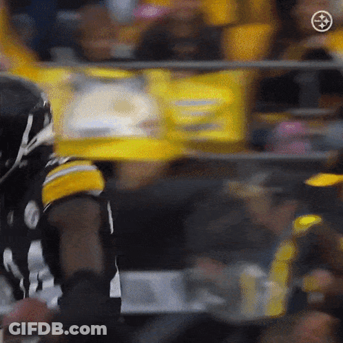 Blurred Football Player With Steelers Logo GIF