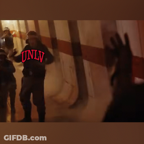 Blurred Group Of People With Only In Red Letters GIF