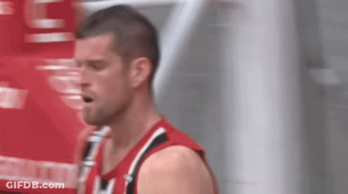 Blurred Man In Red And Black Jersey With Letter L GIF