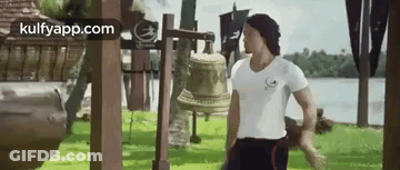 Blurred Man In Red And Black Jersey With Letter L GIF