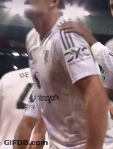 Blurred Man In White Shirt Saying Dragon GIF