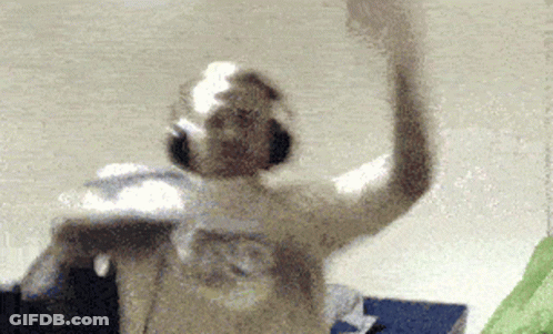 Blurred Person Dancing With Headphones GIF