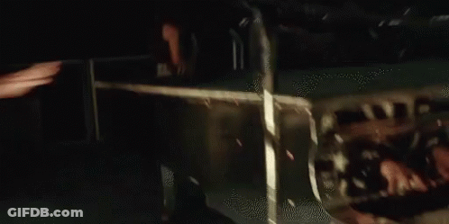 Blurred Person Holding II Flag GIF