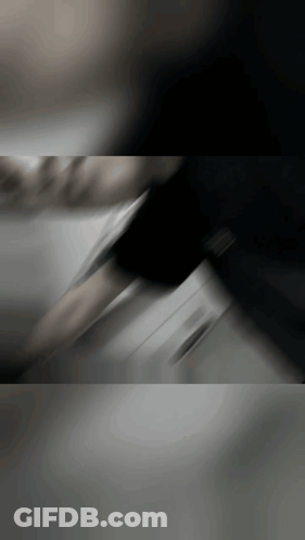 Blurred Person In Black Shirt GIF