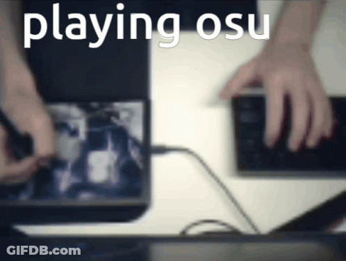 Blurred Person Playing Osu On Laptop GIF