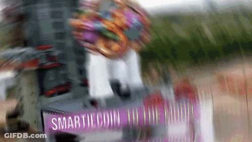 Blurred Person Riding Scooter Saying Smarticoin GIF