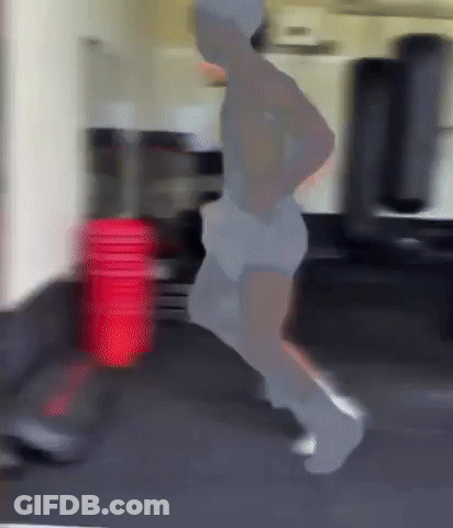 Blurred Person Running In Gym GIF