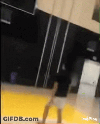 Blurred Person Standing On Yellow Floor With Imgplay GIF