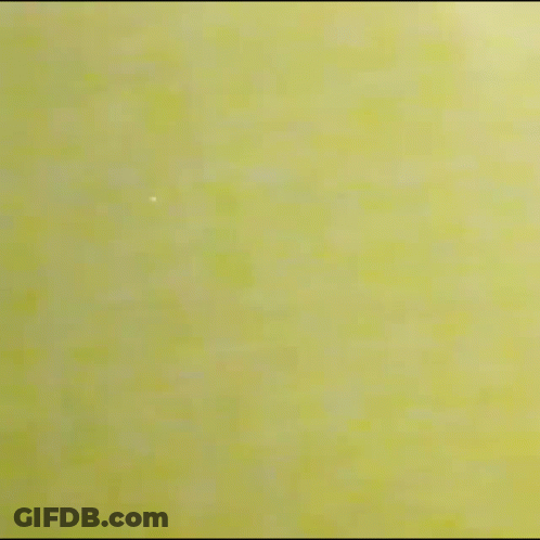 Blurred Person Walking Down Hallway GIF