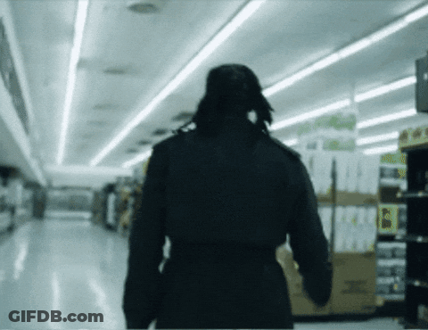 Blurred Person Walking In Store Saying I GIF