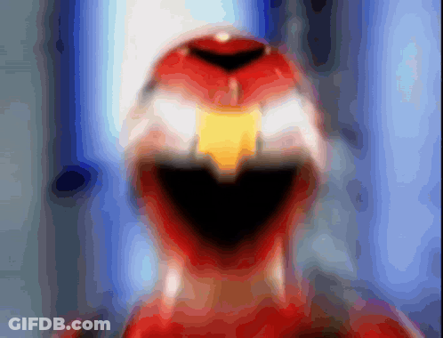 Blurred Red Power Ranger With Yellow Beak GIF