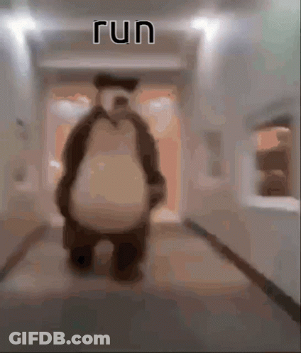 Blurred Teddy Bear In Hallway Saying Run GIF