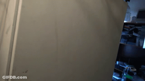 Blurred Wall With Papers GIF