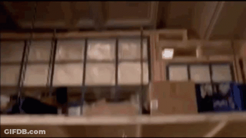 Blurred Warehouse With Shelves Of Boxes GIF
