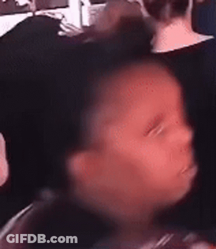 Blurry Baby Sleeping In Chair GIF