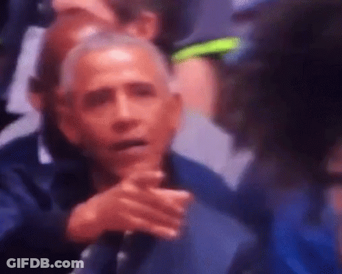 Blurry Barack Obama In Stadium With Folded Hands GIF