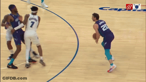 Blurry Basketball Game With Bulls Logo GIF