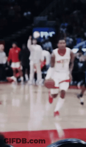 Blurry Basketball Player In White Jersey Number 3 GIF