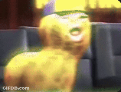 Blurry Cartoon Character Sitting In Theater GIF