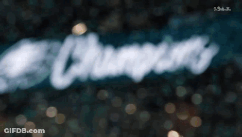 Blurry Champions Text In White GIF