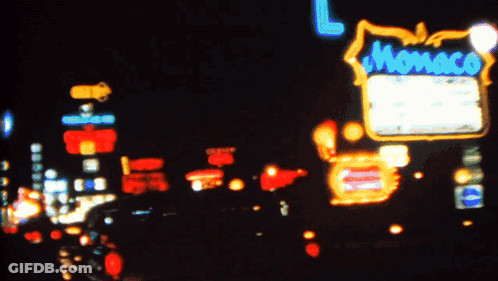 Blurry City At Night With Hollywood Sign GIF