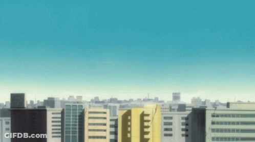 Blurry City Skyline With Blue Sky GIF