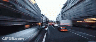 Blurry City Street With Many Cars GIF