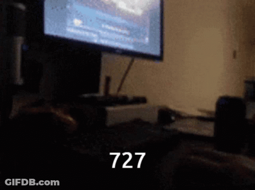 Blurry Computer With Number 727 GIF