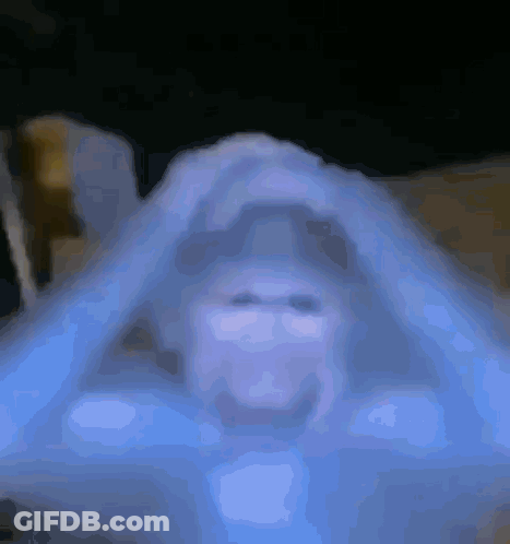 Blurry Face With Blue Glow GIF