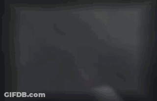 Blurry Face With Green And Red Object GIF