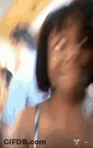 Blurry Face With Triangle In Upper Right Corner GIF