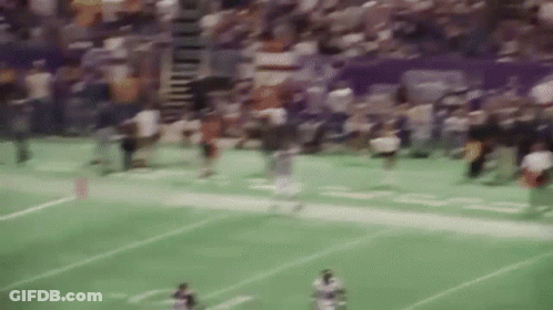 Blurry Football Game In Stadium With Crowd GIF