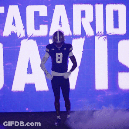 Blurry Football Player In Blue Jersey Number 15 GIF