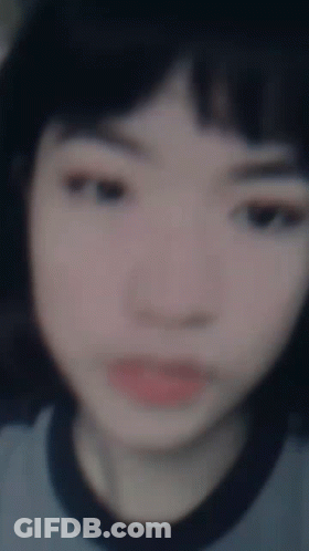 Blurry Girl In Blue Shirt GIF