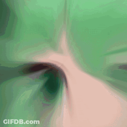 Blurry Girl With Green Hair And Red Headband GIF