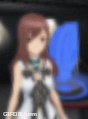 Blurry Girl With Red Hair In Front Of Blue Screen GIF