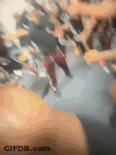 Blurry Group Of People Walking Down Street GIF