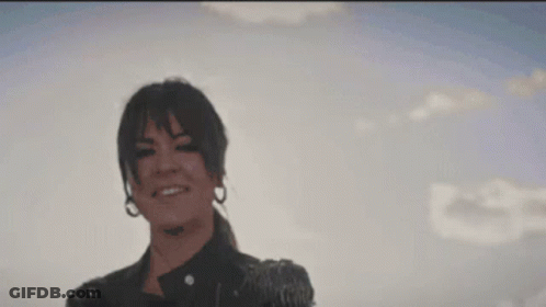 Blurry Hand Reaching For Sun GIF