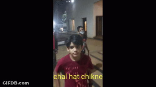 Blurry Image Of Person Walking Chal Hat Chikne In Yellow GIF