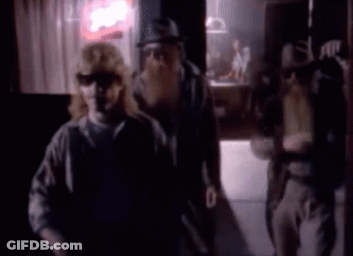 Blurry Man And Woman In Dark Room GIF